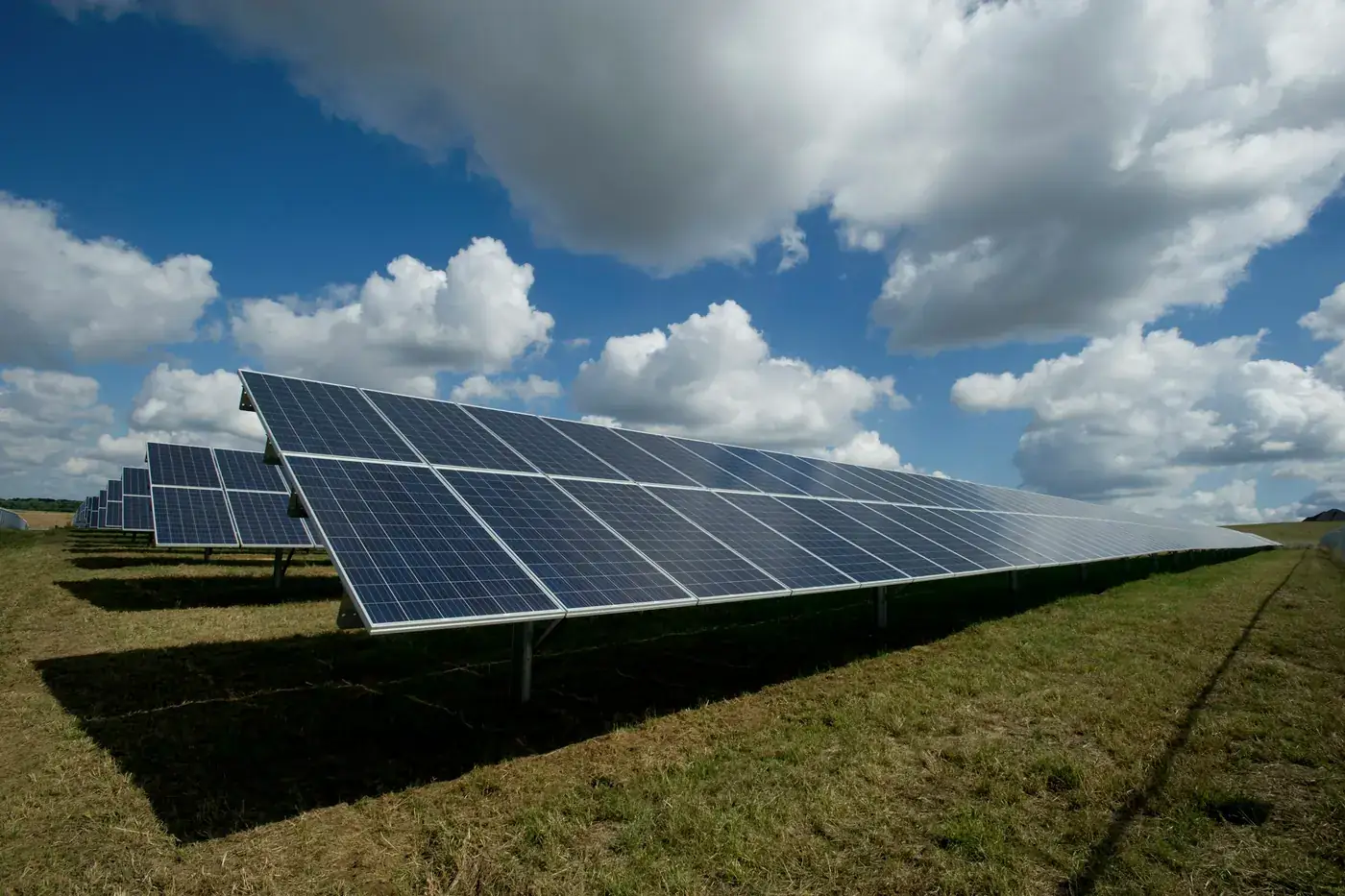 Commercial rooftop solar panel array installed on a business building in Pakistan